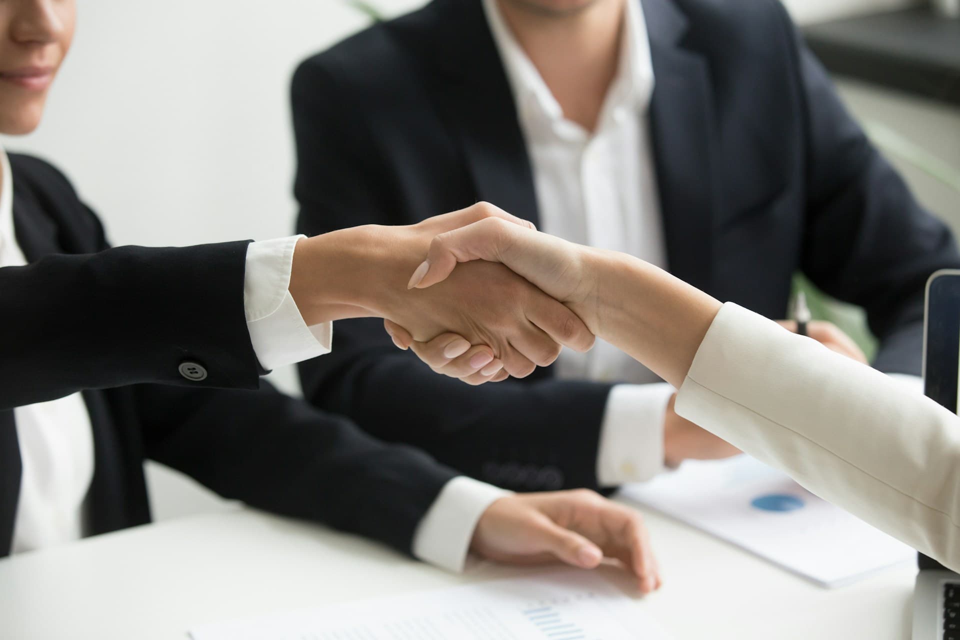 Business handshake representing partnership and trust